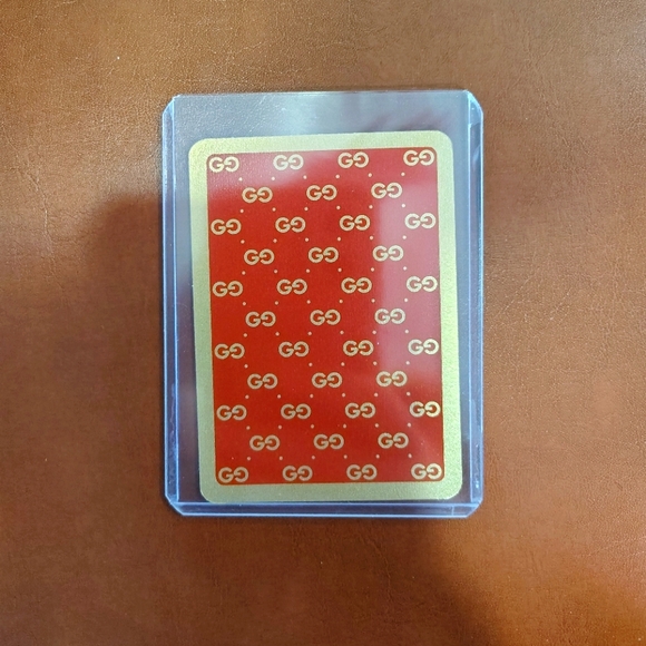 Gucci Accessories - Gucci Red And Gold 3 Of Hearts Playing Card